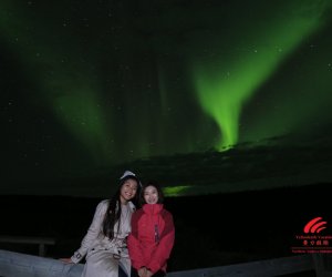 Green-Northern-Lights-Yellowknife-Vacations