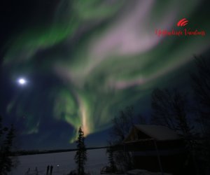 Moon-with-multi-color-aurora-borealis-Yellowknife-Vacations