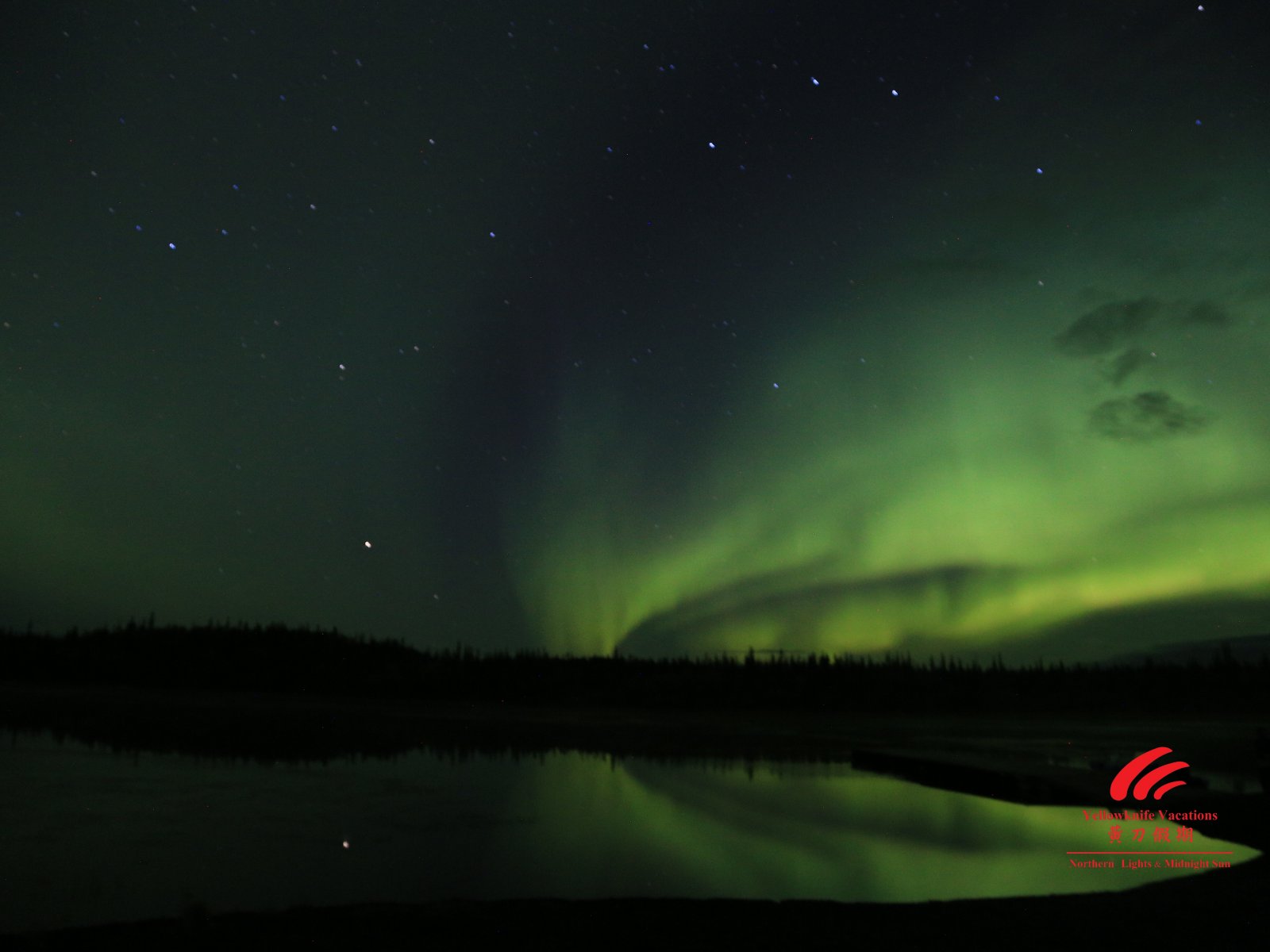 Aurora Borealis by the lake Yellowknife Vacations | Yellowknife Vacations