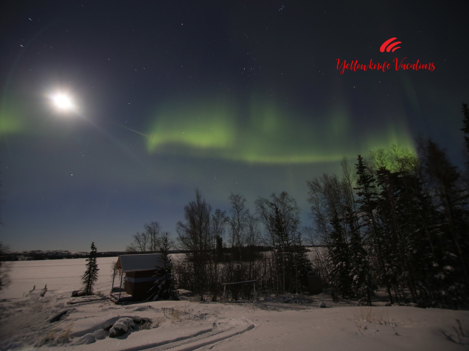 Aurora Borealis and moon Yellowknife Vacations | Yellowknife Vacations